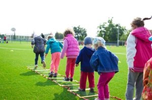 kids playing on the grass